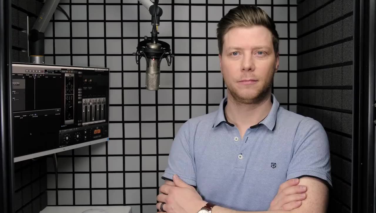 Andy Zimmermann at the microphone in his recording booth